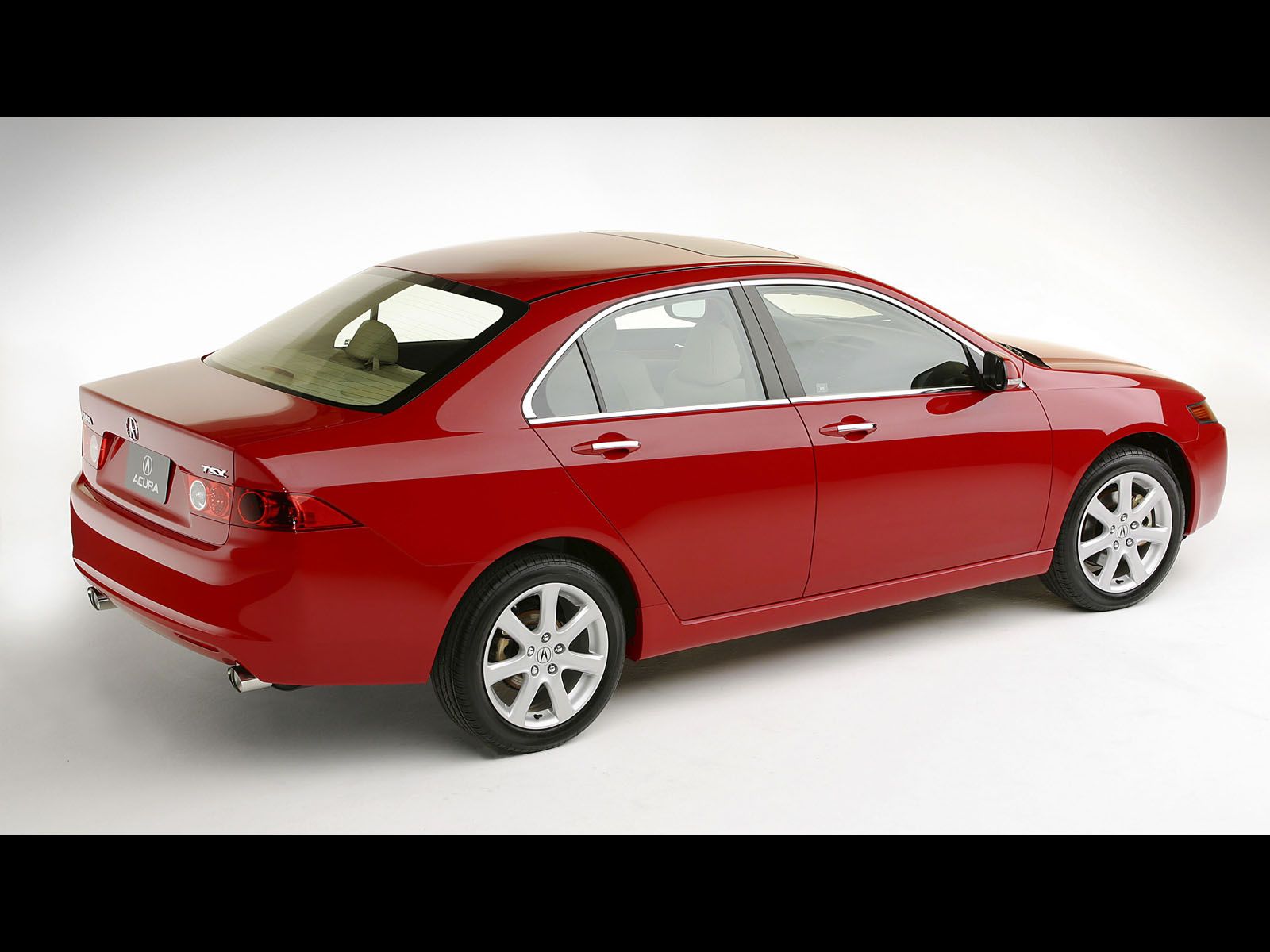Acura TSX side view in red